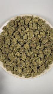 PUFFY Snow Cap is a sativa-dominant hybrid THCa strain bred from the iconic pairing of Snow White and Haze. The aroma is a bold blend of peppery spice, gassy undertones, and rich doughy notes. Visually, dense spring green buds with purple hues and fiery orange pistils are coated in sticky trichomes. Consumers often report feeling euphoric, energetic, uplifted, inspired, and focused, with a noticeable boost in creativity and motivation.
