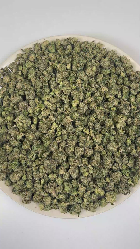PUFFY Supreme Runtz (smalls) is an indica-dominant hybrid THCa strain, crafted from the powerhouse fusion of (Gucci × Blue Dream × Gorilla Glue) and Forbidden Runtz. The aroma is a rich blend of sweet candy notes layered with pungent gas and a crisp hint of pine. Visually, dense dark green buds with purple hues and fiery orange pistils are coated in sticky trichomes. Consumers often report euphoric, uplifting effects that ease into soothing physical relaxation, promoting a happy, creative, and sociable mood
