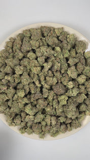 PUFFY Super Boof is a balanced hybrid THCa strain created from the exotic blend of Black Cherry Punch and Tropicana Cookies. The aroma bursts with vibrant notes of grapefruit, lime, and oranges, offering a sharp and juicy citrus character. Visually, it showcases dense, chunky buds in vivid olive green, adorned with fiery orange hairs and cloaked in a sparkling frost of trichomes. Consumers often report effects that are uplifting, euphoric, and creatively stimulating, while also providing a sense of relaxati