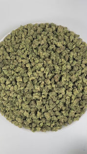 PUFFY Candy Gelato (smalls) is a balanced hybrid THCa strain born from a complex cross of Blue Oreoz × Cotton Candy Gelato / Candyland × GG4 × Gelato. The aroma bursts with sweet candy and ripe berry notes, complemented by a sharp, gassy undertone. Visually, its dense, colorful nugs range from dark forest green to vibrant purple, often coated in a heavy layer of frosty trichomes. Consumers commonly report a fast-acting euphoric lift, delivering mental stimulation and a creative spark making it an ideal comp