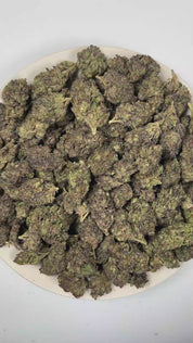 PUFFY Mango is an indica THCa strain crafted from the exceptional cross of strain KC 33 and Afghani. The aroma opens with vibrant tropical fruit, layered with the juicy sweetness of ripe mango and finished with a smooth, creamy undertone that adds a rich, velvety finish. Visually, dense forest green buds with purple hues and fiery orange pistils are coated in sticky trichomes. Consumers often report a euphoric, uplifting onset that gradually transitions into a deeply relaxing full-body calm, melting away st