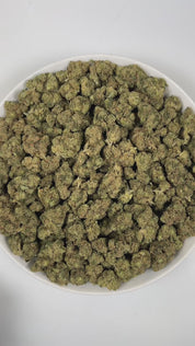 PUFFY Jack Herer is a sativa-dominant hybrid THCa strain, bred from a legendary three‑way genetic cross of Northern Lights #5, Shiva Skunk, and Haze. The aroma is a sharp and pungent blend of zesty lime, chemical undertones, and a distinct hint of ammonia. Visually, dense green buds with purple hues and fiery orange pistils are coated in sticky trichomes. Consumers often report euphoric, energetic, focused, and uplifting sensations, along with potential relief from stress and anxiety and a noticeable boost 