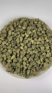 PUFFY Modified Grapes (smalls) is a balanced hybrid THCa strain crafted from the exceptional cross of GMO and Purple Punch. The aroma is a sweet and inviting blend of honey and ripe berries, complemented by subtle herbal notes. Visually, dense forest green buds with purple hues and fiery orange pistils are coated in sticky trichomes. Consumers often report a lifting wave of euphoria that elevates mood, sparks creativity, encourages warm and friendly social interactions, and promotes a relaxing experience id