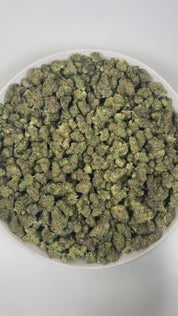 PUFFY Pine OG (smalls) is a sativa-dominant hybrid THCa strain meticulously developed with a captivating complexity, often rumored to draw inspiration from OG Kush. The aroma opens with sharp notes of pine and refreshing eucalyptus, layered over a distinct, lingering gassy undertone. Visually, dense forest green buds with purple hues and fiery orange pistils are coated in sticky trichomes. Consumers often report a euphoric, uplifting sensation that sparks creativity, sharpens focus, and elevates mood.