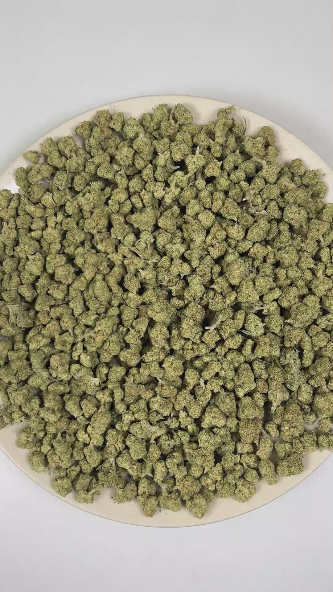 PUFFY Papaya (smalls) is a balanced hybrid THCa strain created from a cross between Citral #13 and Ice #2. Aroma is a vibrant blend of ripe melons, lush tropical fruit, and sweet candy notes. Visually, dense spring green buds with purple hues and fiery orange pistils are coated in sticky trichomes.  Consumers often describe the effects as euphoric and uplifting, delivering a gentle cerebral buzz that elevates mood before gradually settling into a soothing full-body calm ideal for relaxation and unwinding. 