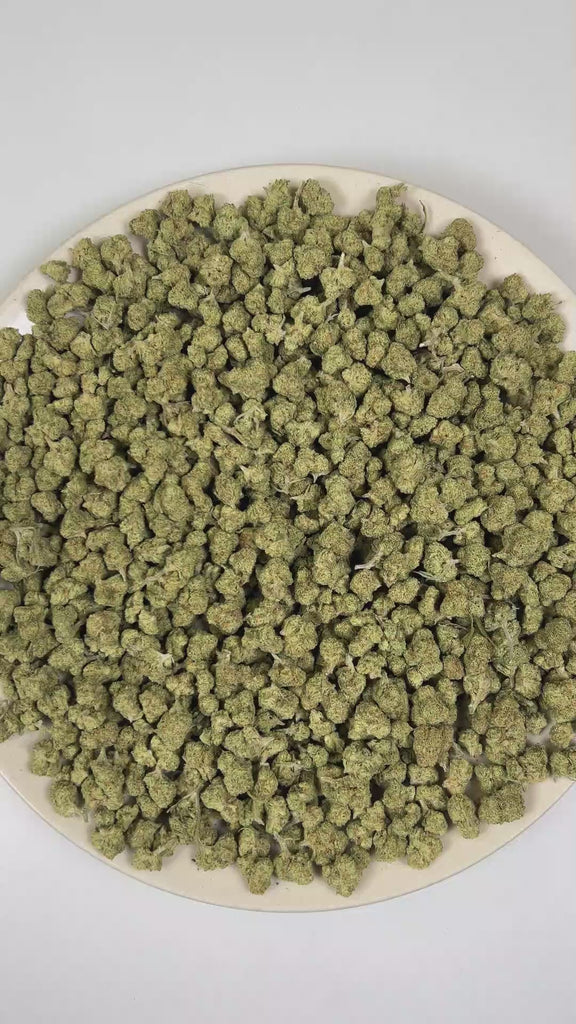 PUFFY Papaya (smalls) is a balanced hybrid THCa strain created from a cross between Citral #13 and Ice #2. Aroma is a vibrant blend of ripe melons, lush tropical fruit, and sweet candy notes. Visually, dense spring green buds with purple hues and fiery orange pistils are coated in sticky trichomes.  Consumers often describe the effects as euphoric and uplifting, delivering a gentle cerebral buzz that elevates mood before gradually settling into a soothing full-body calm ideal for relaxation and unwinding. 