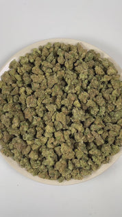 PUFFY Blue Dream (smalls) is a sativa-dominant hybrid THCa strain, crafted from the lush pairing of Blueberry and Haze. The aroma is dominated by ripe blueberry sweetness, complemented by gassy undertones and a sharp, chemical edge. Visually stunning, its dense, bright green buds are accented by deep blue hues, fiery orange pistils, and a generous dusting of icy trichomes making it as eye-catching as it is effective. Consumers often report a euphoric, uplifting head high that flows into a gentle, motivating