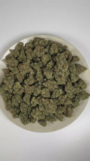 PUFFY Jack Herer is a sativa-dominant hybrid THCa strain, bred from a legendary three‑way genetic cross of Northern Lights #5, Shiva Skunk, and Haze. The aroma is a refreshing blend of bright citrus and crisp pine, complemented by warm, earthy spices. Visually, dense green buds with purple hues and fiery orange pistils are coated in sticky trichomes. Consumers often report euphoric, energetic, focused, and uplifting sensations, along with potential relief from stress and anxiety and a noticeable boost in cr