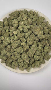 PUFFY ORZ is an indica-dominant hybrid THCa strain derived from the celebrated fusion of  Cookies and Cream and Secret Weapon. The aroma is rich and inviting, blending doughy sweetness with smooth vanilla notes and a warm, freshly baked cake finish. Visually, dense forest green buds with hints of purple are threaded with fiery orange pistils and coated in a sparkling layer of sticky trichomes. The consumers often report a euphoric experience accompanied by a calm, mentally relaxed state that gently soothes 