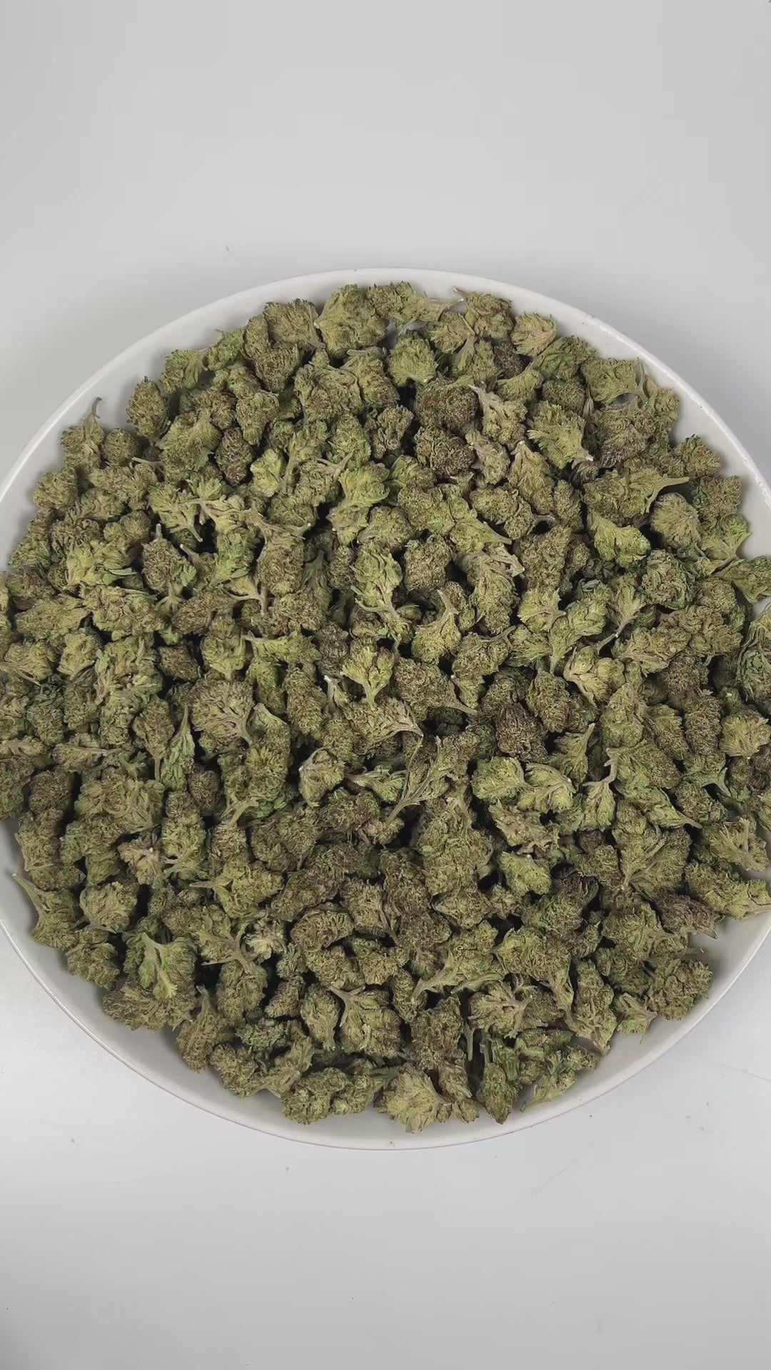 PUFFY Purple Gas (smalls) is an indica-dominant hybrid THCa strain, crafted from the renowned cross of Bubba Kush × Sour Diesel. The aroma bursts with rich fuel notes, layered with warm woody undertones and a hint of spicy complexity that awakens the senses. Visually, dense moss green buds with purple hues and fiery orange pistils are coated in sticky trichomes. Consumers often report a balanced high that leaves them feeling relaxed, euphoric, and happy, providing soothing relief for both mind and body.