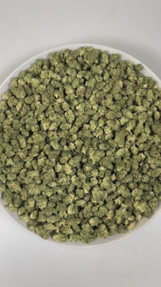 PUFFY Government Mule (smalls) is an indica-dominant hybrid THCa strain, born from the legendary pairing of G13 and Deep Chunk. The aroma is a rich blend of herbal notes, warm spices, and subtle hints of cedar, creating a soothing and earthy fragrance. Visually, dense green buds with hints of purple are threaded with fiery orange pistils and coated in a sparkling layer of sticky trichomes. Consumers often report a wave of happy, euphoric, and focused mental clarity accompanied by strong calming and deeply r