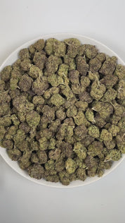 PUFFY Mike Jones OG is a balanced hybrid THCa strain, born from the hybridization of Creeper #2 and Tahoe Cherry Treat. The aroma bursts with sweet fruity notes layered over rich berries, all underscored by a pungent gassy finish. Visually, dense pine green buds with hints of purple are threaded with fiery orange pistils and coated in a sparkling layer of sticky trichomes. Consumers often report a euphoric and uplifting high that gradually settles into a smooth, calming sense of relaxation.