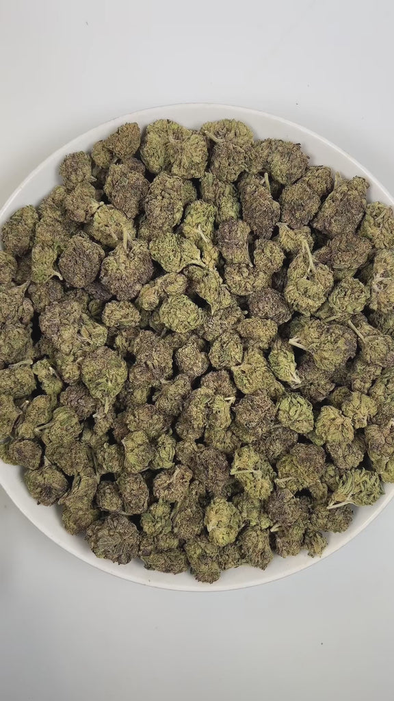 PUFFY Mike Jones OG is a balanced hybrid THCa strain, born from the hybridization of Creeper #2 and Tahoe Cherry Treat. The aroma bursts with sweet fruity notes layered over rich berries, all underscored by a pungent gassy finish. Visually, dense pine green buds with hints of purple are threaded with fiery orange pistils and coated in a sparkling layer of sticky trichomes. Consumers often report a euphoric and uplifting high that gradually settles into a smooth, calming sense of relaxation.