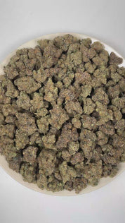 PUFFY Candy Crusher is an indica-dominant THCa strain, originating from the contemporary candy dessert lineage. The aroma is a vibrant blend of sweet candy, juicy melon, and bright fruity notes, creating a lush, candy-like fragrance with a refreshing tropical undertone. Visually, dense spring green buds with purple hues and fiery orange pistils are coated in sticky trichomes. Consumers often report an euphoric and uplifting mood with a cerebral boost, followed by gentle physical relaxation that promotes str