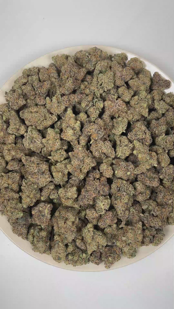 PUFFY Candy Crusher is an indica-dominant THCa strain, originating from the contemporary candy dessert lineage. The aroma is a vibrant blend of sweet candy, juicy melon, and bright fruity notes, creating a lush, candy-like fragrance with a refreshing tropical undertone. Visually, dense spring green buds with purple hues and fiery orange pistils are coated in sticky trichomes. Consumers often report an euphoric and uplifting mood with a cerebral boost, followed by gentle physical relaxation that promotes str
