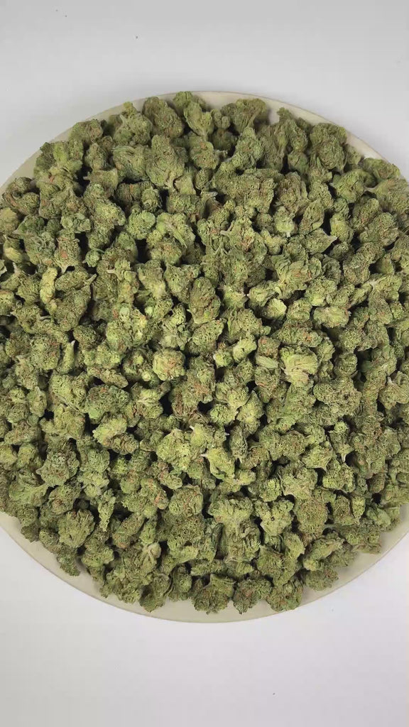 PUFFY Blue Dream (smalls) is a sativa-dominant hybrid THCa strain, crafted from the lush pairing of Blueberry and Haze. The aroma blends tropical fruit sweetness with zesty citrus notes and a bold fuel-like finish. Visually, dense forest green buds with purple hues and fiery orange pistils are coated in sticky trichomes. Consumers often report a euphoric, uplifting head high that flows into a gentle, motivating body buzz, perfect for clear, creative daytime energy.    