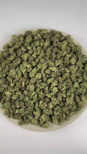 PUFFY Sour Tangie (smalls) is a sativa-dominant hybrid THCa strain, hailing from the legendary genetics of East Coast Sour Diesel and Tangie. The aroma starts with bright, sour citrus notes, followed by a subtle fuel-like finish. Visually, the dense buds display rich forest-green tones with hints of purple, accented by vibrant orange pistils and enveloped in a frosty layer of trichomes. Consumers often report a cerebral, uplifting head high that sparks euphoria, focus, and inspiration, accompanied by gentle
