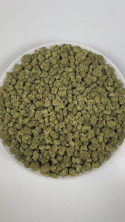 PUFFY Blue Andeze (smalls) is a balanced hybrid THCa strain born from the legendary cross of Thin Mint Girl Scout Cookies and DJ Short Blueberry. The aroma presents a bold blend of sweet blueberries, sharp chemical notes, and a distinct tar-like undertone. Visually, dense deep green buds with purple hues and fiery orange pistils are coated in sticky trichomes. Consumers often report a euphoric and uplifting experience paired with soothing, deep relaxation that can help relieve stress and unwind.