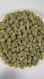 PUFFY Alien OG is a balanced hybrid THCa strain, spawned from the renowned pairing of Tahoe OG and Alien Kush. The aroma presents a well-balanced blend of pine, earthy undertones, and smooth cream. Visually, dense green buds with purple hues and fiery orange pistils are coated in sticky trichomes. Consumers often report a fast-onset cerebral high that brings euphoria, uplifted mood, creativity, and focus, followed by soothing body relaxation. 