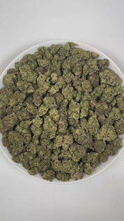 PUFFY Nightshade is an indica-dominant hybrid THCa strain, crafted from the legendary lineage of Kashmir × Nepalese landrace. The aroma is a bold and complex blend of woody undertones, sharp cheesy notes, and pungent gassy hints, creating a striking and memorable scent profile. Visually, dense dark green buds with purple hues and fiery orange pistils are coated in sticky trichomes. Consumers often report that this strain is deeply relaxing and calming, creating a soothing sense of comfort while delivering a