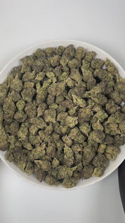 PUFFY Blueberry ZKZ is an indica-dominant hybrid THCa strain, crafted from the legendary lineage of Blueberry × ZKZ. The aroma bursts with sweet blueberry, intertwined with delicate floral notes and a refreshing hint of eucalyptus, creating an inviting and uplifting scent profile. Visually, the buds are dense with subtle blue hues, vibrant orange pistils, and a thick, shimmering coating of frosty trichomes. Consumers often report an uplifted mood and creative spark accompanied by a relaxing, mellow body eff