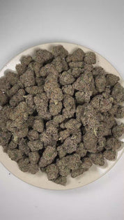 PUFFY Gnarvana is a balanced hybrid THCa strain crafted through the unique combination of Peanut Butter Pie and Z Code. The aroma blends sweet candy and pungent diesel notes with a subtle herbal finish of thyme. Visually, dense deep forest-green buds with purple hues and fiery orange pistils are coated in sticky trichomes. Consumers often report feeling euphoric and uplifted, with a creative, focused mindset accompanied by a calming sense of relaxation and overall ease. 