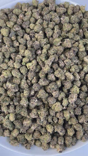 PUFFY Midnight Runtz (smalls) is an indica-dominant THCa strain, bred from a powerhouse cross of Runtz with Funky Charms. The aroma bursts with sweet and fruity notes, balanced by a warm hint of spice and grounded in a rich, earthy undertone. Visually, the blooms burst with lush emerald and royal purple hues, laced with vivid orange pistils and dusted in a glistening blanket of crystal-like trichomes. Consumers often describe it as delivering a rush of creative energy and elevated mood, sparking euphoria wh