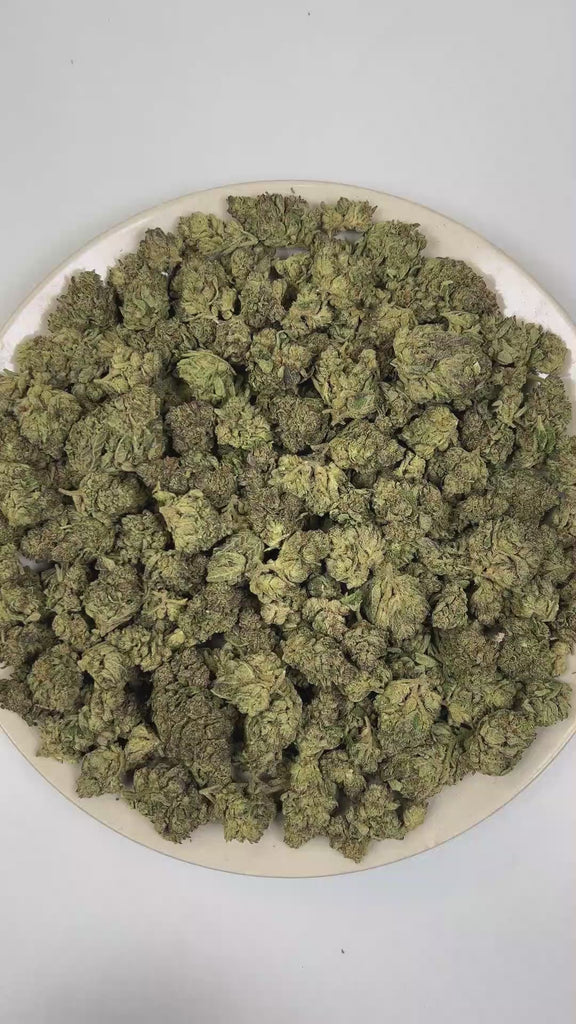 PUFFY Frozen Jelly is an indica-dominant hybrid THCa strain crafted through the genetic blending of Jelly Breath and Permafrost. The aroma opens with a vibrant blend of sweet fruity notes and delicate floral undertones, layered with a rich fuel-like depth. Visually, dense forest green buds with purple hues and fiery orange pistils are coated in sticky trichomes. Consumers often report a euphoric sense of uplift paired with a relaxed body sensation, delivering clear-headed calm and effective stress relief wh