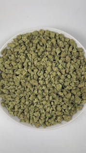 PUFFY MAC 1 (smalls) (Miracle Alien Cookies) is a balanced hybrid THCa strain, from the renowned pairing of Alien Cookies F2 with a Miracle 15. The aroma is a bold and intriguing blend of diesel, sweet papaya, and juicy melon, creating a vibrant and unforgettable scent experience. Visually captivating, the buds are thick and resinous, shimmering with frosty trichomes, while vibrant orange pistils thread through shades of dark green and purple. Consumers often report that it delivers euphoric cerebral uplift
