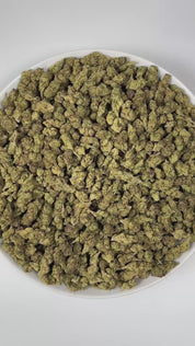 PUFFY Chemlato (smalls) is a balanced hybrid THCa strain, born from the cross of Gelato #33 and Chemdawg. The aroma opens with bright citrus notes, layered with a sharp fuel-like edge and a deeply pungent finish. Visually, the buds are dense, featuring light green and purple hues, vibrant orange pistils, and a sparkling layer of trichomes. Consumers often report an initial uplifting and euphoric mental high that sparks creativity, gradually transitioning into a calm and mellow body sensation.
