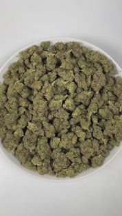 PUFFY Sour Diesel is a sativa-dominant hybrid THCa strain, born from the pairing of Chemdawg and Super Skunk. The aroma is a bold, pungent blend of funk, sharp chemicals, and gasoline, creating an intense and unmistakably edgy scent profile. Visually, this strain features dense light-green buds accented by vibrant orange pistils and a thick, frosty layer of trichomes. Consumers often report that this strain enhances mood, sharpens focus, and sparks creativity with its uplifting, cerebral, and energizing eff