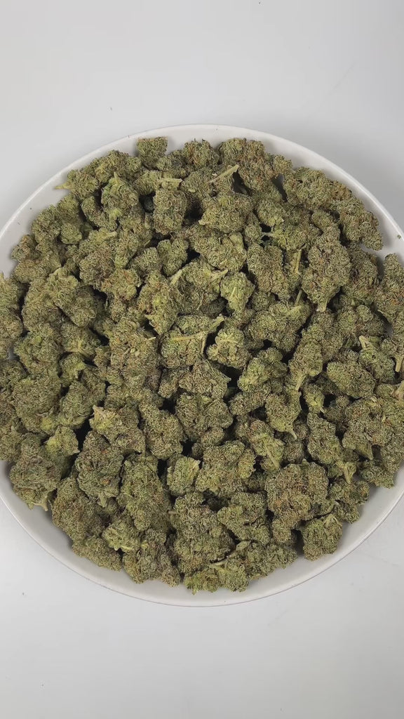 PUFFY Sour Diesel is a sativa-dominant hybrid THCa strain, born from the pairing of Chemdawg and Super Skunk. The aroma is a bold, pungent blend of funk, sharp chemicals, and gasoline, creating an intense and unmistakably edgy scent profile. Visually, this strain features dense light-green buds accented by vibrant orange pistils and a thick, frosty layer of trichomes. Consumers often report that this strain enhances mood, sharpens focus, and sparks creativity with its uplifting, cerebral, and energizing eff