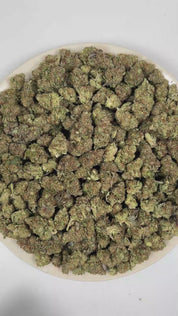 PUFFY Purple Skunk is a sativa-dominant hybrid THCa strain formulated through the selective pairing of  Skunk #1 and Purple Kush. The aroma opens with a pungent fusion of sharp onions, savory garlic, and deep gassy undertones. Visually, dense forest green buds with purple hues and fiery orange pistils are coated in sticky trichomes. Consumers often report feeling euphoric and invigorated, with enhanced focus, creativity, and a bright, mentally stimulating experience. 