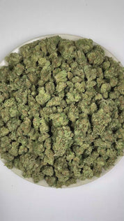 PUFFY Blue Dream is a sativa-dominant hybrid THCa strain, crafted from the lush pairing of Blueberry and Haze. The aroma features a vibrant tropical profile complemented by herbal nuances and a medley of warm, aromatic spices. Visually, dense forest green buds with purple hues and fiery orange pistils are coated in sticky trichomes. Consumers often report a euphoric, uplifting head high that flows into a gentle, motivating body buzz, perfect for clear, creative daytime energy.    