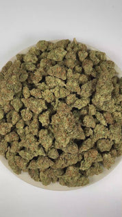 PUFFY Violet Fog is an indica-dominant hybrid THCa strain meticulously blended from Grape Gasoline and Khalifa Mints. The aroma is distinctly skunky and gassy, with a sharp fuel-like finish. Visually, dense lime green buds with purple hues and fiery orange pistils are coated in sticky trichomes. Consumers often report that it delivers a euphoric experience that smoothly melts away stress and gently guides both mind and body into peaceful, restorative relaxation.   