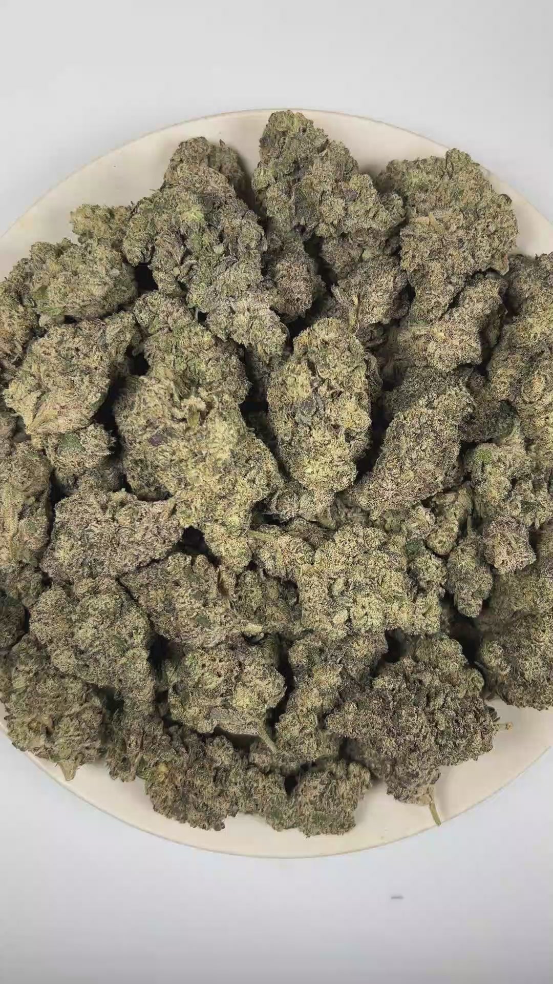PUFFY Donkey Butter is an indica-dominant hybrid THCa strain formulated through the selective pairing of Kosher Kush and Tangie. The aroma opens with bold diesel fumes layered over rich skunky earthiness, finishing with a deeply pungent intensity. Visually, dense forest green buds with purple hues and fiery orange pistils are coated in sticky trichomes. Consumers often report an uplifting wave of euphoria accompanied by a mild cerebral boost that promotes an elevated mood, followed by deep body relaxation a