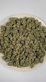 PUFFY Shock Tart (smalls) is a balanced hybrid THCa strain rooted in the exceptional lineage of Purple Thai and Afghani. The aroma opens with bold notes of pungent fuel and bright citrus, layered with a rich gassy finish. Visually, dense deep forest green buds with purple hues and fiery orange pistils are coated in sticky trichomes. Consumers often report feeling euphoric, content, relaxed, and focused, offering a soothing yet mentally engaging experience. 