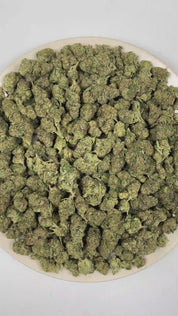 PUFFY Animal Face is an sativa-dominant hybrid THCa strain resulting from the strategic pairing of Face Off OG and Animal Mints. The aroma opens with warm, earthy spices, layered with sharp savory onion notes and finished by a bold, pungent gassy undertone. Visually, dense forest green buds with purple hues and fiery orange pistils are coated in sticky trichomes. Consumers often report a euphoric, uplifting onset that delivers a clear-headed, focused experience before gradually transitioning into deep physi