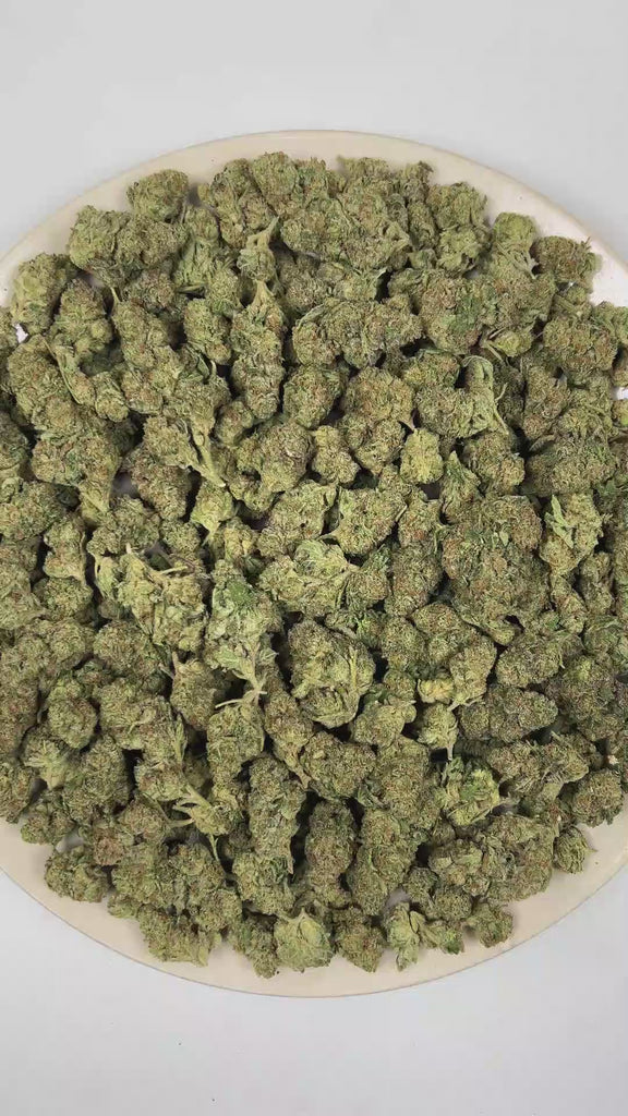 PUFFY Animal Face is an sativa-dominant hybrid THCa strain resulting from the strategic pairing of Face Off OG and Animal Mints. The aroma opens with warm, earthy spices, layered with sharp savory onion notes and finished by a bold, pungent gassy undertone. Visually, dense forest green buds with purple hues and fiery orange pistils are coated in sticky trichomes. Consumers often report a euphoric, uplifting onset that delivers a clear-headed, focused experience before gradually transitioning into deep physi