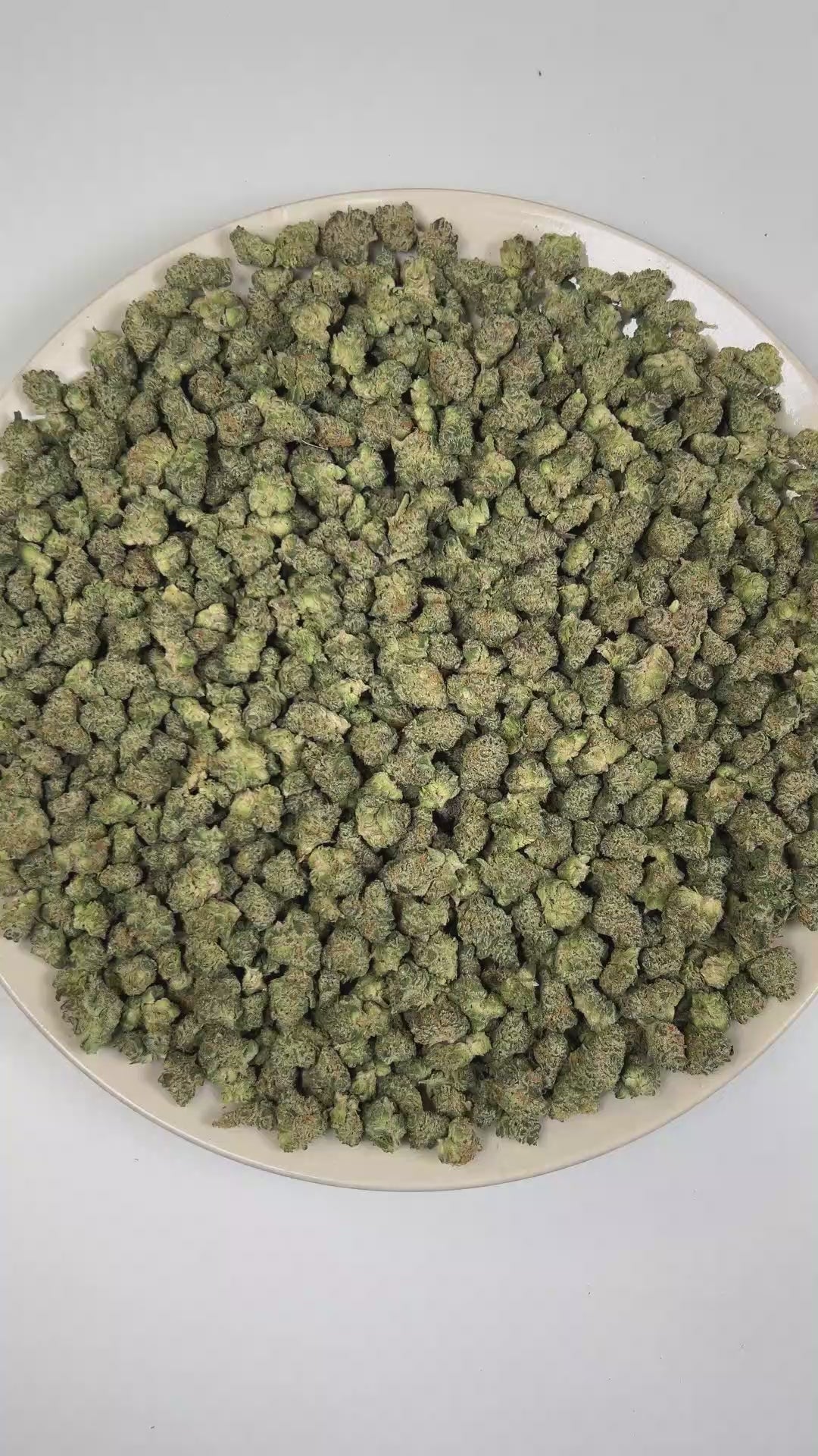 PUFFY 24K Gold (smalls) is an indica-dominant hybrid THCa strain formulated through the selective pairing of Kosher Kush and Tangie. The aroma features a vibrant citrus-forward profile of fresh oranges, zesty grapefruit, and bright lemon notes. Visually, dense forest green buds with purple hues and fiery orange pistils are coated in sticky trichomes. Consumers often report a euphoric and uplifting cerebral buzz that enhances mood and creativity before easing into a gentle, soothing body relaxation, potentia