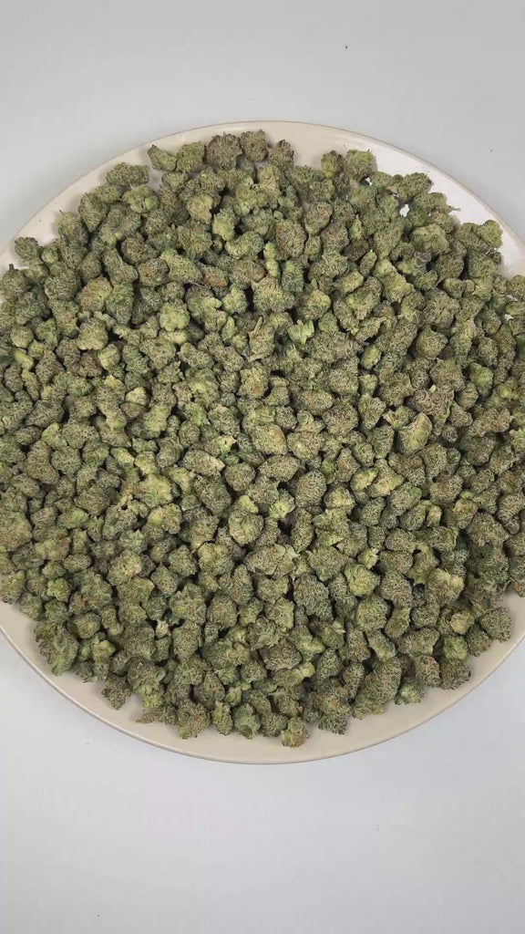 PUFFY 24K Gold (smalls) is an indica-dominant hybrid THCa strain formulated through the selective pairing of Kosher Kush and Tangie. The aroma features a vibrant citrus-forward profile of fresh oranges, zesty grapefruit, and bright lemon notes. Visually, dense forest green buds with purple hues and fiery orange pistils are coated in sticky trichomes. Consumers often report a euphoric and uplifting cerebral buzz that enhances mood and creativity before easing into a gentle, soothing body relaxation, potentia