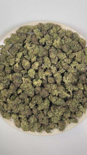 PUFFY Gelato Cream is a balanced hybrid THCa strain bred through the premium union of Wedding Cake and Gelato 33. The aroma is a rich blend of sweet, creamy undertones layered with bright, juicy fruit notes. Visually, dense deep forest green buds with purple hues and fiery orange pistils are coated in sticky trichomes. Consumers often report feeling euphoric, energetic, uplifted, creative, joyful, and gently relaxed, creating a balanced and mood-enhancing experience that supports both mental stimulation and