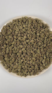 PUFFY Gelato Cake (smalls) is an indica-dominant hybrid THCA strain resulting from the expertly blended union of Gelato #33 and Wedding Cake. The aroma is a rich blend of peppery spice, doughy warmth, and subtle sweet undertones that come together for a smooth, balanced profile. Visually, dense deep forest green buds with purple hues and fiery orange pistils are coated in sticky trichomes. Consumers often describe the effects as euphoric and uplifting at onset, promoting mental clarity and a happy, mood-boo