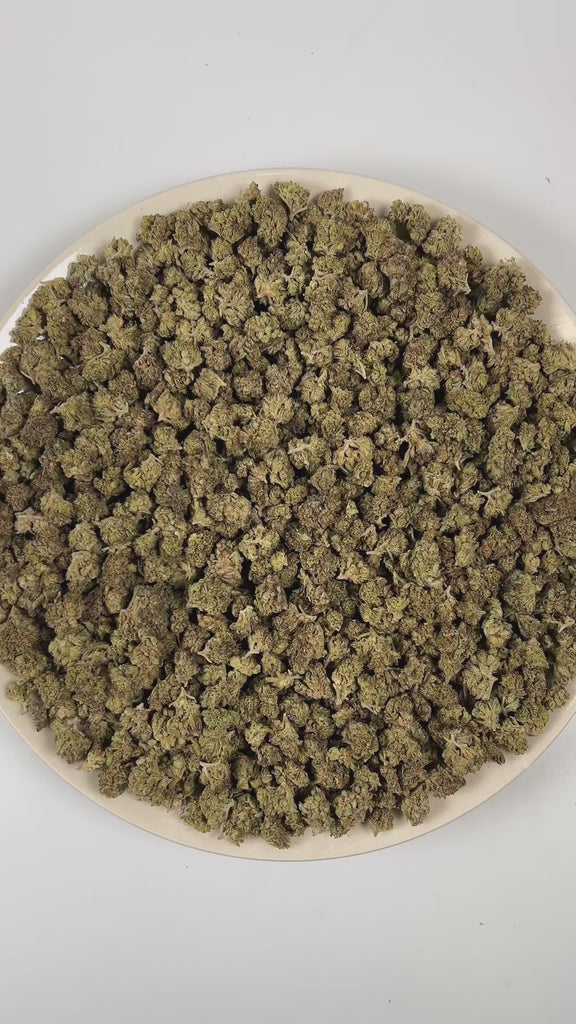 PUFFY Gelato Cake (smalls) is an indica-dominant hybrid THCA strain resulting from the expertly blended union of Gelato #33 and Wedding Cake. The aroma is a rich blend of peppery spice, doughy warmth, and subtle sweet undertones that come together for a smooth, balanced profile. Visually, dense deep forest green buds with purple hues and fiery orange pistils are coated in sticky trichomes. Consumers often describe the effects as euphoric and uplifting at onset, promoting mental clarity and a happy, mood-boo