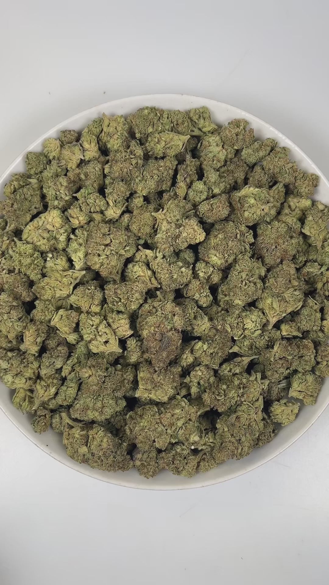 PUFFY Snow Bunny is a balanced hybrid THCa strain, showcasing an exclusive, undocumented cross crafted outside traditional genetic records. The aroma is a decadent blend of sweet vanilla, rich creaminess, and warm, doughy undertones, inviting you into a comforting and indulgent sensory experience. Visually, dense green buds with rich purple hues and fiery orange pistils, all snow covered in a thick, glistening layer of sticky trichomes. Consumers often report an uplifting euphoria with a cheerful mood, clea