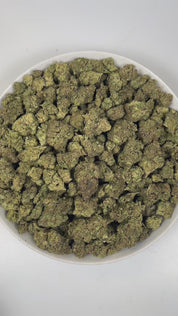 PUFFY Snow Bunny is a balanced hybrid THCa strain, showcasing an exclusive, undocumented cross crafted outside traditional genetic records. The aroma is a decadent blend of sweet vanilla, rich creaminess, and warm, doughy undertones, inviting you into a comforting and indulgent sensory experience. Visually, dense green buds with rich purple hues and fiery orange pistils, all snow covered in a thick, glistening layer of sticky trichomes. Consumers often report an uplifting euphoria with a cheerful mood, clea