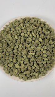 PUFFY Blue Skunk (smalls) is an indica-dominant hybrid THCa strain, born from the exotic blend of Blueberry and Skunk. The aroma is a bold blend of sweet blueberries layered with funky, earthy undertones and a distinct cheesy richness that adds depth and complexity. Visually, buds are dense and frosty, featuring deep green and purple hues with bright orange pistils and a thick coating of sparkling trichomes. Consumers often report a relaxing and euphoric experience accompanied by bursts of laughter, along w