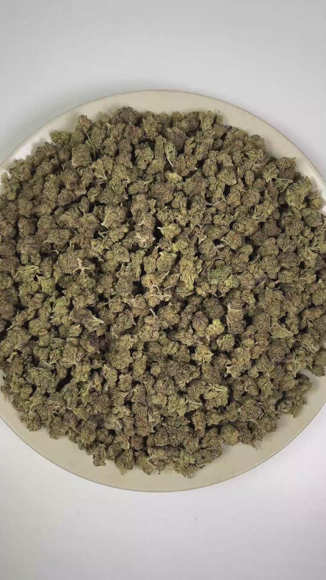 PUFFY Black Magic (smalls) is a lush indica THCa strain with a genetic lineage that remains undisclosed, adding an air of mystery to its unknown heritage. The aroma features earthy herbal notes complemented by a sharp peppery kick and pungent, gassy undertones. Visually, dense forest green buds with purple hues and fiery orange pistils are coated in sticky trichomes. Consumers often report feeling euphoric and uplifted, accompanied by a calm, relaxing sensation.