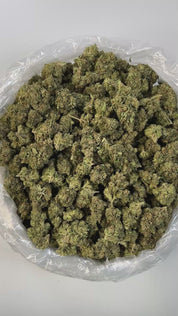 PUFFY OG Kush is an indica-dominant hybrid THCa strain crafted from a potent lineage of Chemdawg, Lemon Thai, and Hindu Kush. It delivers a complex aroma profile that blends earthy notes with hints of pine and fresh soil. Visually, the buds are dense and sticky, showcasing a vibrant lime green color accented by bright orange pistils and a generous coating of trichomes. Consumers often describe the effects as euphoric and uplifting at the onset, gradually transitioning into a state of deep relaxation and men