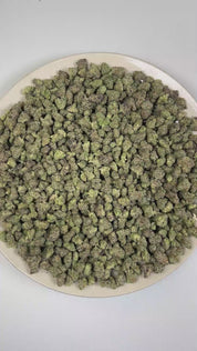PUFFY Alaskan Ice (smalls) is a sativa-dominant hybrid THCa strain born from the legendary pairing of White Widow and Haze. The aroma features a refreshing blend of sweet melon, earthy pine, and subtle spicy notes. Visually, dense forest green buds with purple hues and fiery orange pistils are coated in sticky trichomes. Consumers often report experiencing a euphoric and uplifted state accompanied by enhanced creativity, energetic motivation, and a focused, clear-minded experience. 